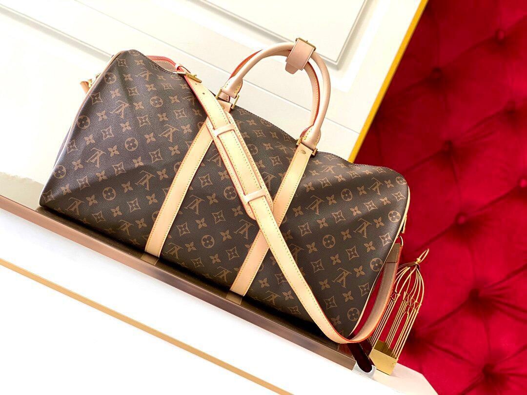 Louis Vuitton Keepall Bandoulière 55 in Tela Monogram - Icona del Viaggio