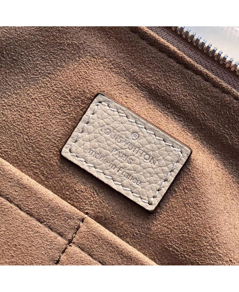 Louis Vuitton Borsa Haumea in Pelle Traforata Mahina - Beige