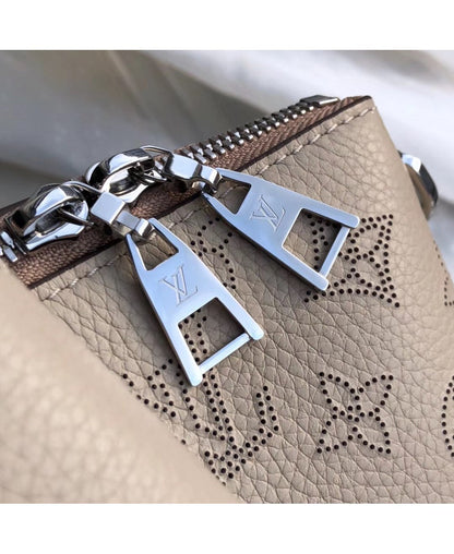 Louis Vuitton Borsa Haumea in Pelle Traforata Mahina - Beige