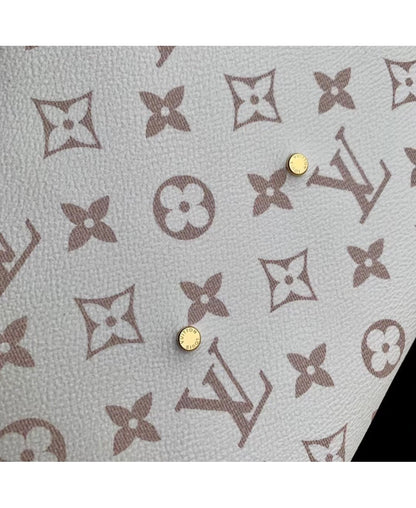 Louis Vuitton Atlantis GM in Tela Monogram Dune