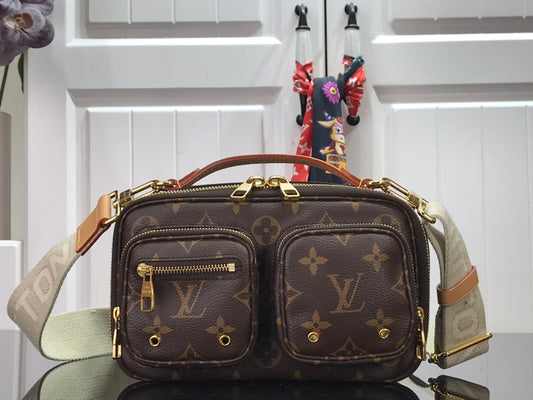 Louis Vuitton Utility in Tela Monogram