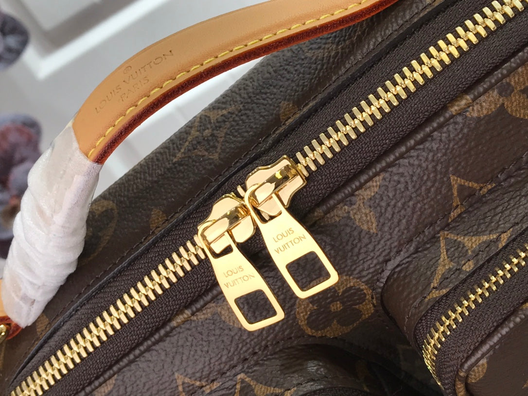 Louis Vuitton Utility in Tela Monogram
